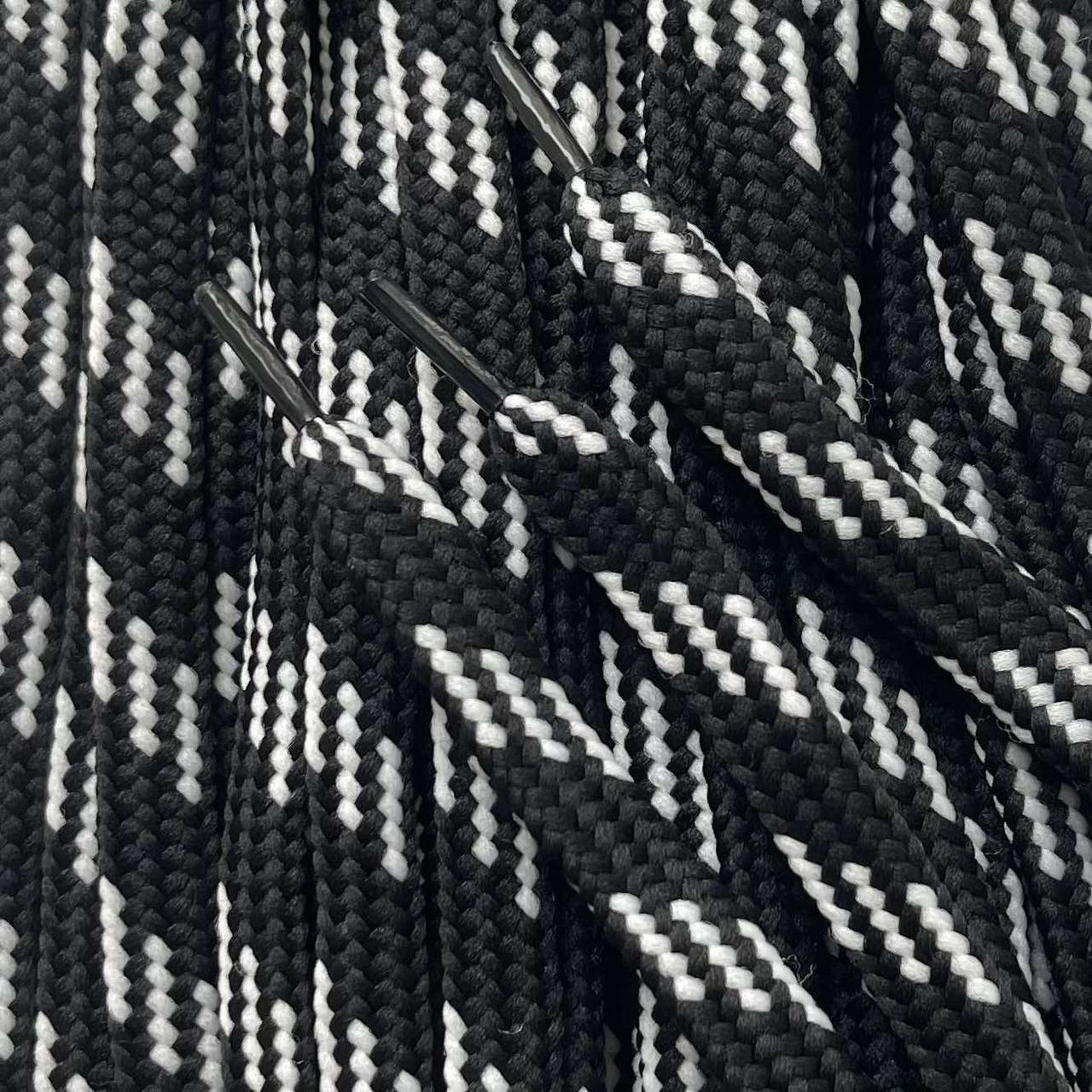 Шнурки полегшені з запаяними кінцями кол біло-чорний 120см (уп 50пар) 318005 фото