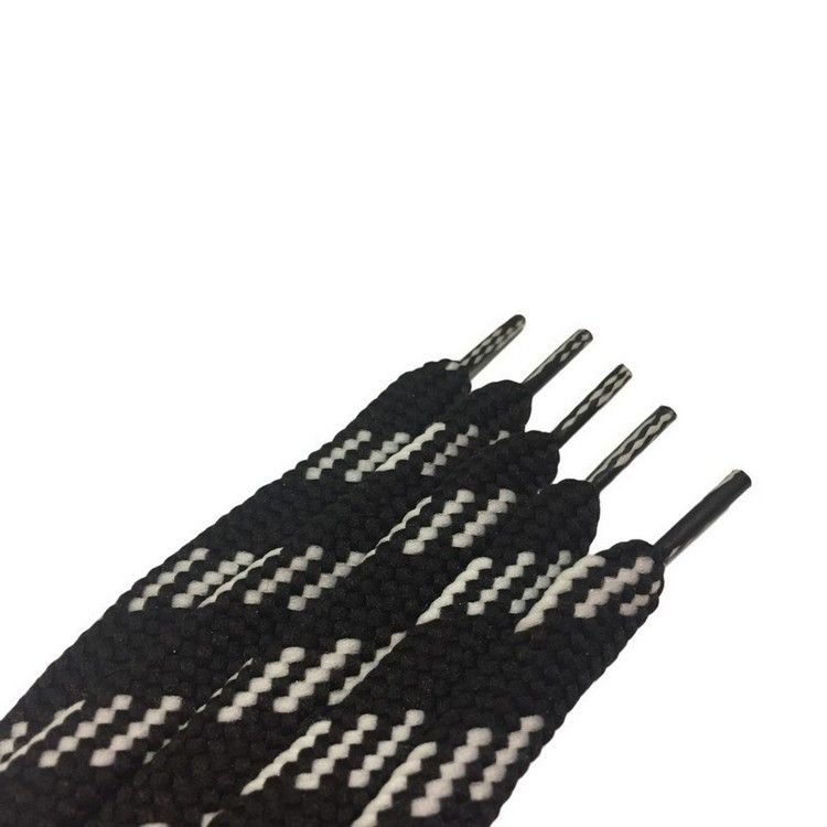 Шнурки облегченные с запаянными концами цв черный пунктир белый 110см (уп 50пар) 318007 фото